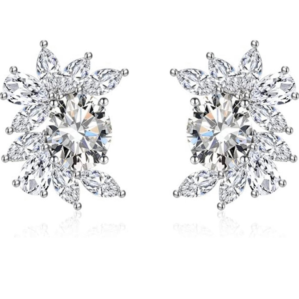 Brand new Sterling silver and CZ  sparkler studs.